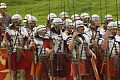 Ermine Street Guard in armour, at ease, Birdoswald Roman Fort, Hadrians Wall, Northumbria, England, United Kingdom, Euruope