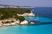 A view of the northeast coast of Anti-Paxos from a taverna above Voutoumi Beach, Anti-Paxos, Ionian Islands, Greek Islands, Greece, Europe