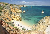 Praia do Camilo (Camilo beach) and coastline, Lagos, western Algarve, Algarve, Portugal, Europe