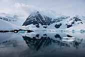 On windstill days, when the mountains and glaciers are reflected in the water's surface, Paradise Bay seems even more magical, Paradise Bay (Paradise Harbor), Danco Coast, Graham Land, Antarctica