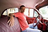 Local man inside his old American car, Vinales, Pinar del Rio, Cuba, West Indies, Central America
