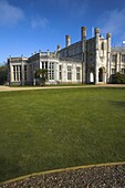 The restored stately home of Highcliffe Castle on the clifftops above Highcliffe Bay, Dorset, England, United Kingdom, Europe