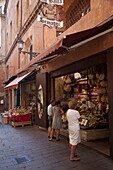 Shops in side street, Piazza Maggiore, Bologna, Emilia Romagna, Italy, Europe