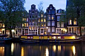 Canal boat and architecture, Amsterdam, Holland, Europe