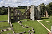 The inner courtyard and gate tower of the 16th century Tudor Cowdray Castle, Midhurst, West Sussex, England, United Kingdom, Europe