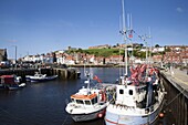Fising boats in the Upper Harbour at Whitby, North Yorkshire, Yorkshire, England, United Kingdom, Europe