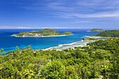 View across Anse l'Islette to the offshore islands of Therese and Conception from hillside above Port Glaud, Port Glaud district, Island of Mahe, Seychelles, Indian Ocean, Africa