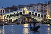The Grand Canal, the Rialto Bridge and gondolas at night, Venice, UNESCO World Heritage Site, Veneto, Italy, Europe