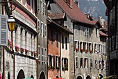 Flower bedecked shuttered windows, Rue Sainte-Claire, Annecy, Rhone Alpes, France, Europe