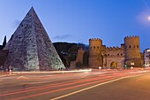 Cestia pyramid and St. Paul Gate, Rome, Lazio, Italy, Europe