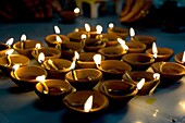 Deepak lights (oil and cotton wick candles) lit for domestic decoration to celebrate the Diwali festival, India