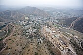 Amber Palace and Amber village in the Aravali hills, seen from the air, Rajasthan, India, Asia