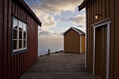 Rorbuer (fishermans huts) on jetty, Lofoten Islands, Norway, Scandinavia, Europe