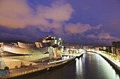 The Guggenheim, designed by Canadian-American architect Frank Gehry, on the Nervion River, Bilbao, Basque country, Spain, Europe