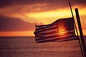 American Flag at sunset, Iraq Memorial, Santa Monica Beach, Los Angeles, California, USA, North America