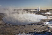 The great geyser Geysir, now dormant (2008), with the more active Strokkur geyser erupting in the distance, Geysir, Haukadalur valley, Golden Circle, Iceland, Polar Regions