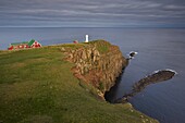 Akraberg lighthouse, Suduroy island, southernmost point of Faroe Islands (Faroes), Denmark, Europe