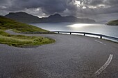 Winding road near Kvivik, and Vestmannasund between Vagar on the right, and Streymoy islands, from Streymoy, Faroe Islands (Faroes), Denmark, Europe