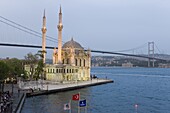 Elevated view over the Bosphorous Bridge and Ortakoy Camii Mosque (Buyuk Mecidiye Camii) in the trendy Ortakoy district,  Istanbul,  Turkey,  Europe