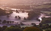 Mist lingers in the Usk Valley at dawn in autumn,  Brecon Beacons National Park,  Powys,  Wales,  United Kingdom,  Europe
