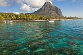 Turquoise water and the Beachcomber Le Paradis five star hotel,  with Mont Brabant in the background,  Mauritius,  Indian Ocean,  Africa