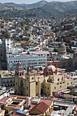 The Basilica de Nuestra Senora de Guanajuato, the yellow building in foreground, with the blue grey building of the University of Guanajuato behind, in Guanajuato, UNESCO World Heritage Site, Guanajuato State, Mexico, North America