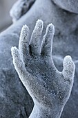 Close-up of frozen hand on sculpture, Milano monumental cemetery, Milan, Lombardy, Italy, Europe