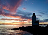 Silhouette of the Annisquam lighthouse at sunset, Annisquam near Rockport, Massachussetts, New England, United States of America, North America
