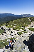 Hikers at Sietos Picos (Seven Peaks), in Guadarrama, Madrid, Spain, Europe