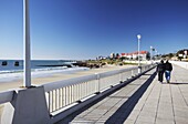 Couple walking along Humewood beachfront, Port Elizabeth, Eastern Cape, South Africa, Africa