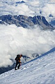Climber on snow field, view from Mont Blanc, Chamonix, French Alps, France, Europe