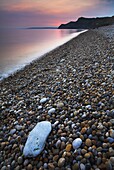 Twilight over the pebbly shore at Eype, Jurassic Coast, UNESCO World Heritage Site, Dorset, England, United Kingdom, Europe