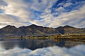 Mountains and autumnal colour beside Lake Wanaka, Otago, South Island, New Zealand, Pacific