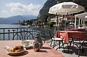 Town and lakeside cafe, Menaggio, Lake Como, Lombardy, Italian Lakes, Italy, Europe
