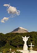 Graveyard and the Concepcion volcano on Ometepe island, Lake Nicaragua, Nicaragua, Central America