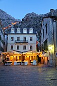 Quiet cafe in the old town of Kotor at night, Kotor, UNESCO World Heritage Site, Montenegro, Europe