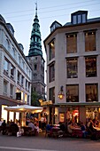 Nikolaj Church and restaurants at dusk, Copenhagen, Denmark, Scandinavia, Europe