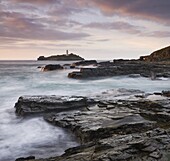 Godrevy Lighthouse off the rocky coast of Godrevy Point, Cornwall, England, United Kingdom, Europe