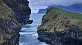 Dramatic coastline at Gjogv on the island of Eysturoy, Faroe Islands, Denmark, Europe