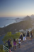 Tourists enjoying view from Sugar Loaf Mountain (Pao de Acucar), Rio de Janeiro, Brazil, South America