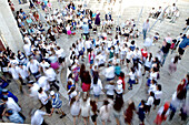 People dancing in a circle on a small square, Jerusalem, Israel