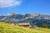 Alpine huts in front of Zimba and Vandanser Steinwand, Raetikon, Vorarlberg, Austria