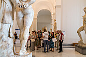 Naples National Archaeological Museum, ancient, art, Hercules Farnese, sculpture, tourist group, guide, Campania, Naples, Napoli, Italy