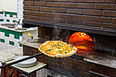 Pizzeria da Michele, Pizza, Marinara and Margherita, simple and traditional, wood-fired oven, dough, pastry, popular, fast-food, Italian, restaurant, lifestyle, culture, cult, famous, Italian food, Naples, Italy