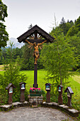 Wayside cross along a path to Partnachklamm, near Garmisch-Partenkirchen, Werdenfels region, Bavaria, Germany