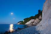 Full moon over the chalk cliff, National Park Jasmund, Ruegen island,  Baltic Sea, Mecklenburg-West Pomerania, Germany