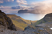 Looking towards the island of Vagar from the mountains of Streymoy in the Faroe Islands, Denmark, Europe