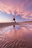 Wooden lighthouse and reflections on Burnham Beach at low tide in winter, Burnham on Sea, Somerset, England, United Kingdom, Europe
