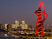 The Orbit, Olympic Park, and Canary Wharf at dusk, London, England, United Kingdom, Europe