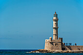 Lighthouse in the Venetian harbour, Chania, Crete, Greece